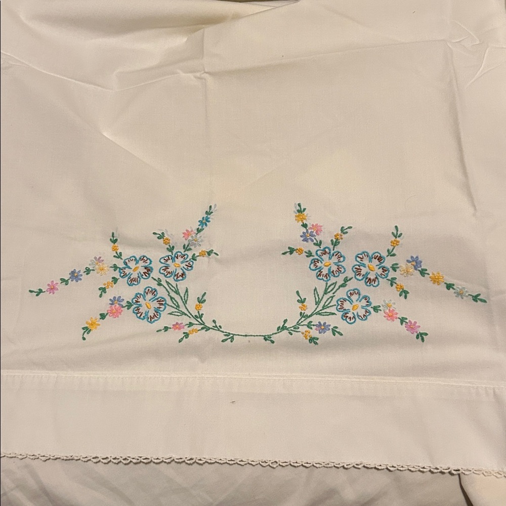 Two Embroidered White Pillowcases